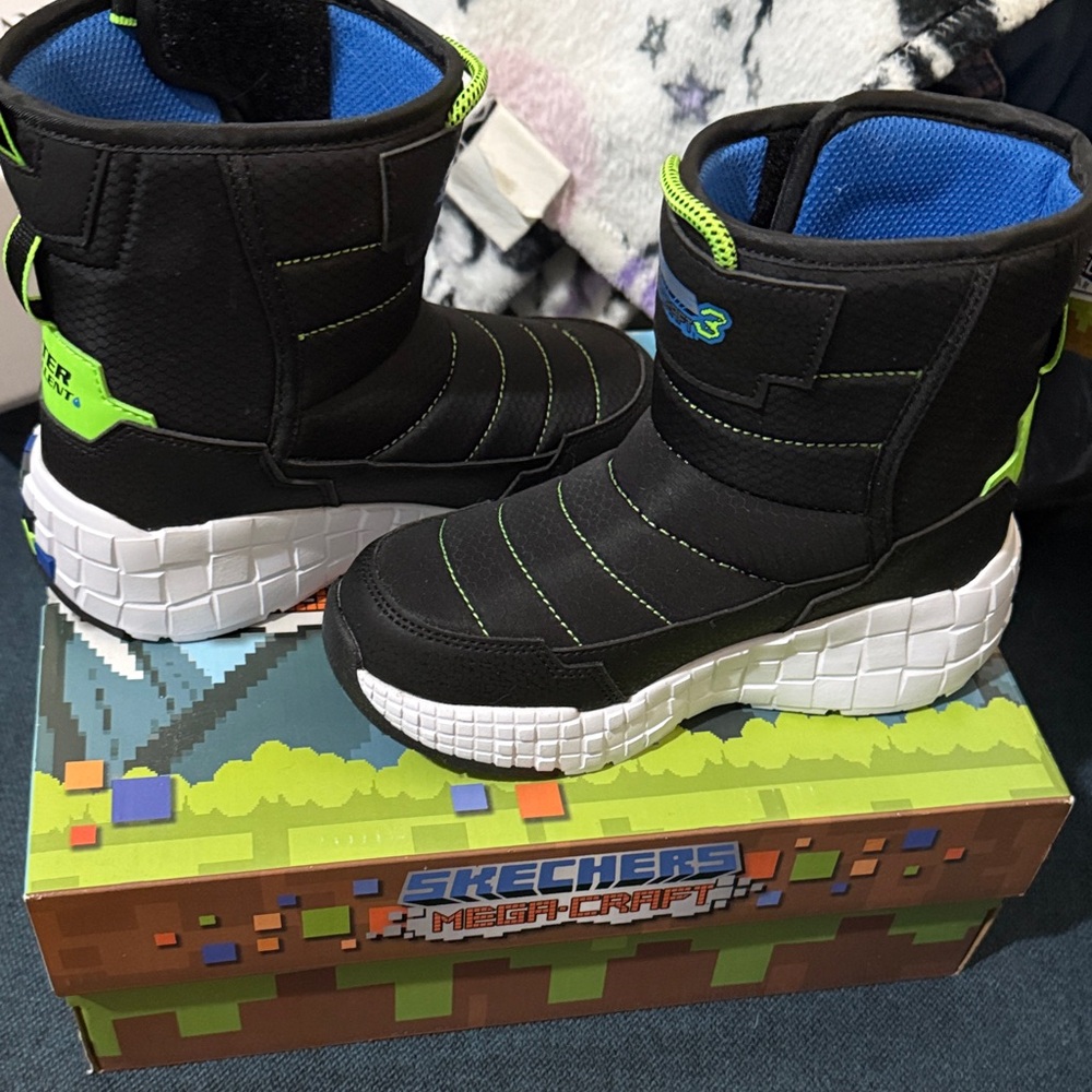 Skechers Kids Black Snow Boots with Green Highlights